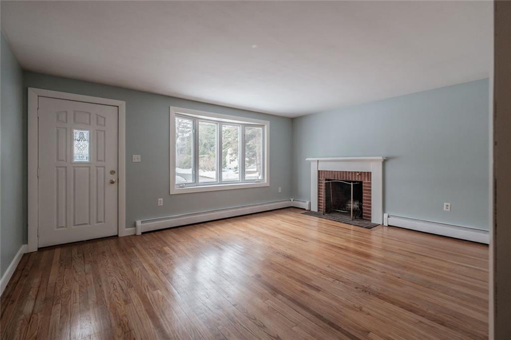 289 Greely Road Cumberland Center, ME 04021 - Photo 9 of 20 Large living room with wood burning...
