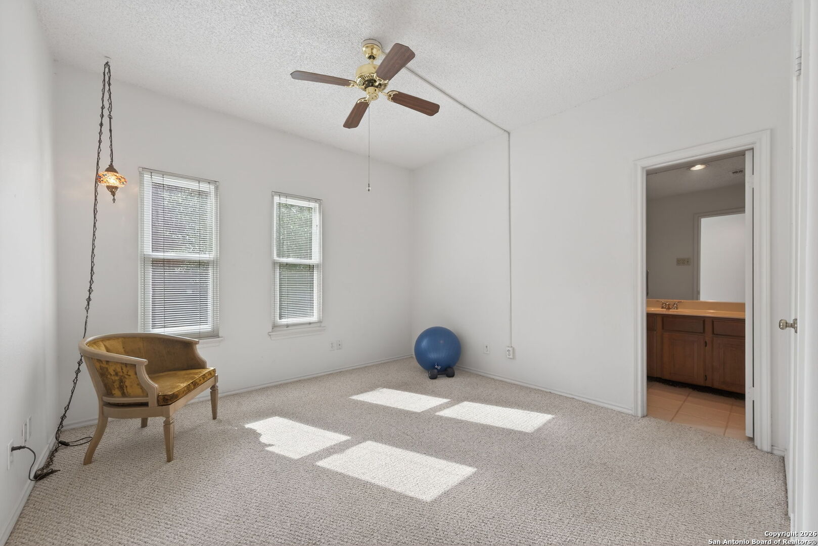 11001 Wurzbach Road, Unit 605 San Antonio, TX 78230 - Photo 29 of 47 a view of livingroom with furniture and windows
