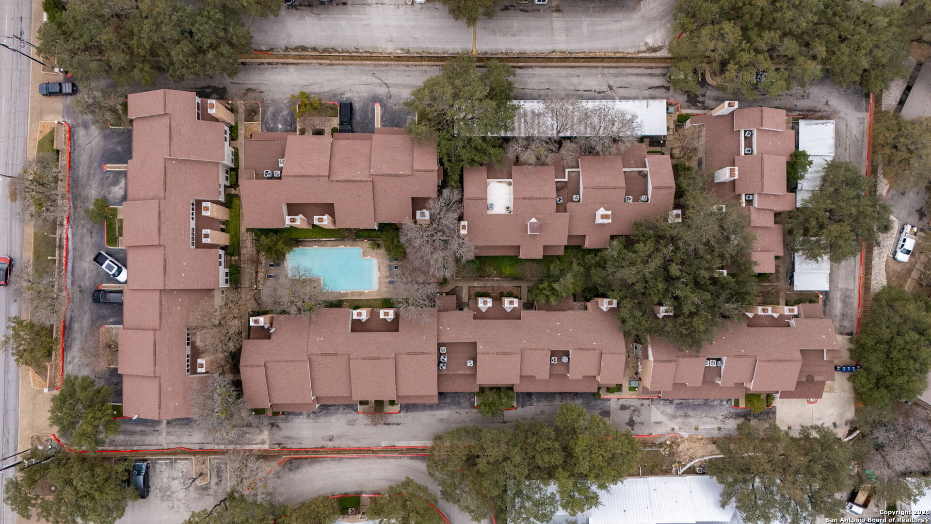 11001 Wurzbach Road, Unit 605 San Antonio, TX 78230 - Photo 36 of 47 an aerial view of residential houses with outdoor space