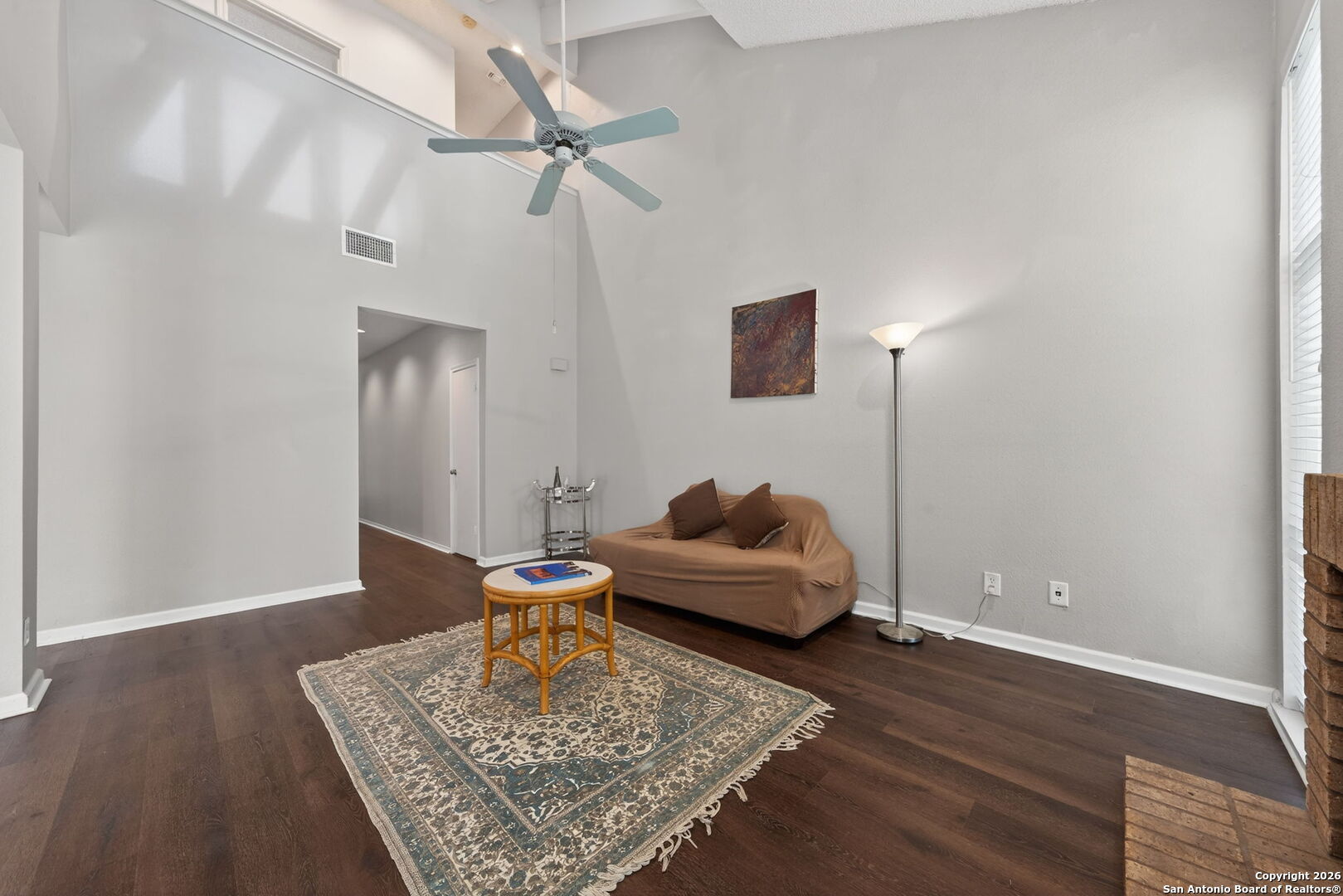 11001 Wurzbach Road, Unit 605 San Antonio, TX 78230 - Photo 6 of 47 a living room with furniture and a rug