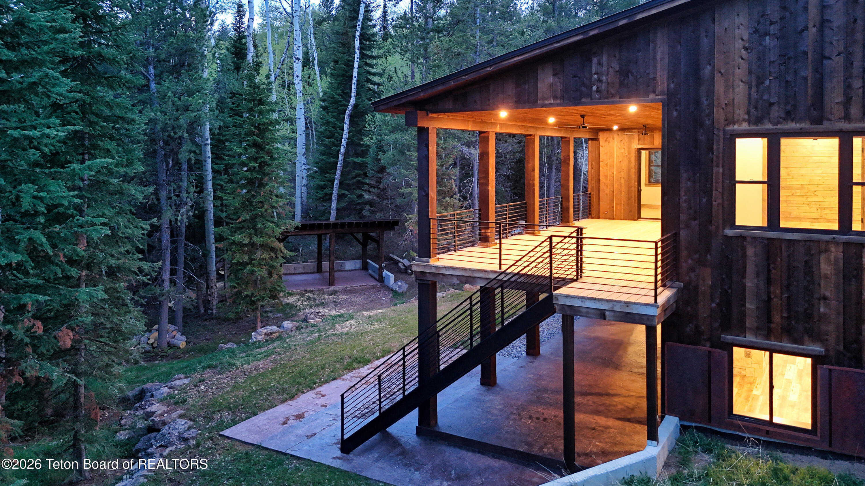 5727 Forest Ridge Road Victor, ID 83455 - Photo 76 of 76 Covered Back Deck and Patio