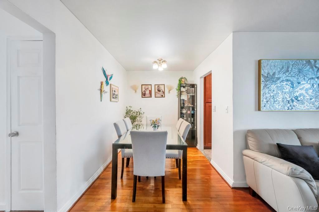 196-72 69th Avenue, Unit 1 Queens, NY 11365 - Photo 9 of 23 Dining space featuring hardwood / wood-style floors