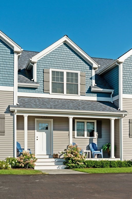 12 Ocean Pines Drive, Unit E Bourne, MA 02562 - Photo 4 of 28 front view of a house