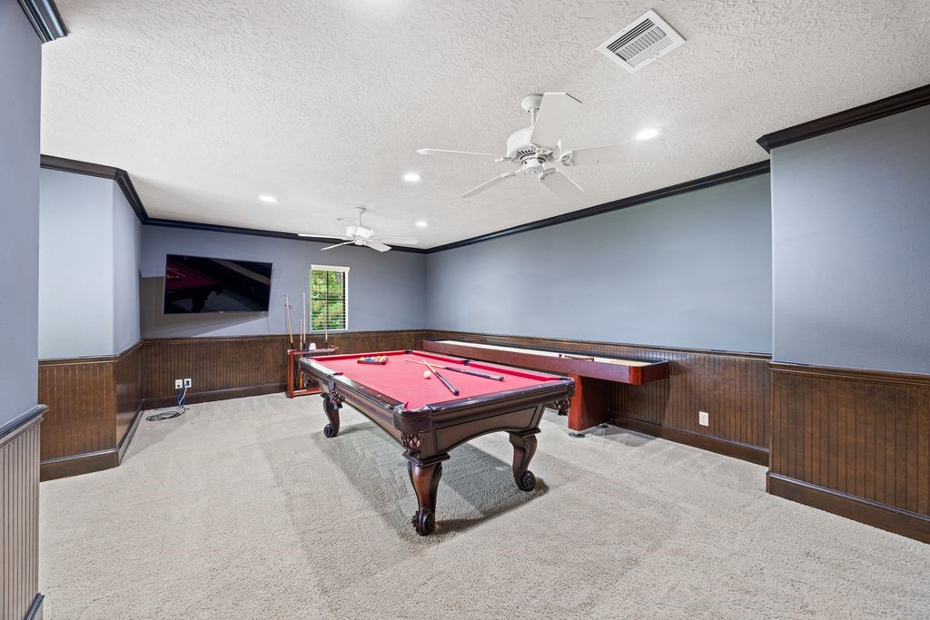 27722 Tiverton Court Spring, TX 77386 - Photo 26 of 33 Space for Everyone
Upstairs, you'll find three additional bedrooms, two full bathrooms, and an oversized game room that offers endless possibilities for recreation, movie nights, or a secondary family lounge.