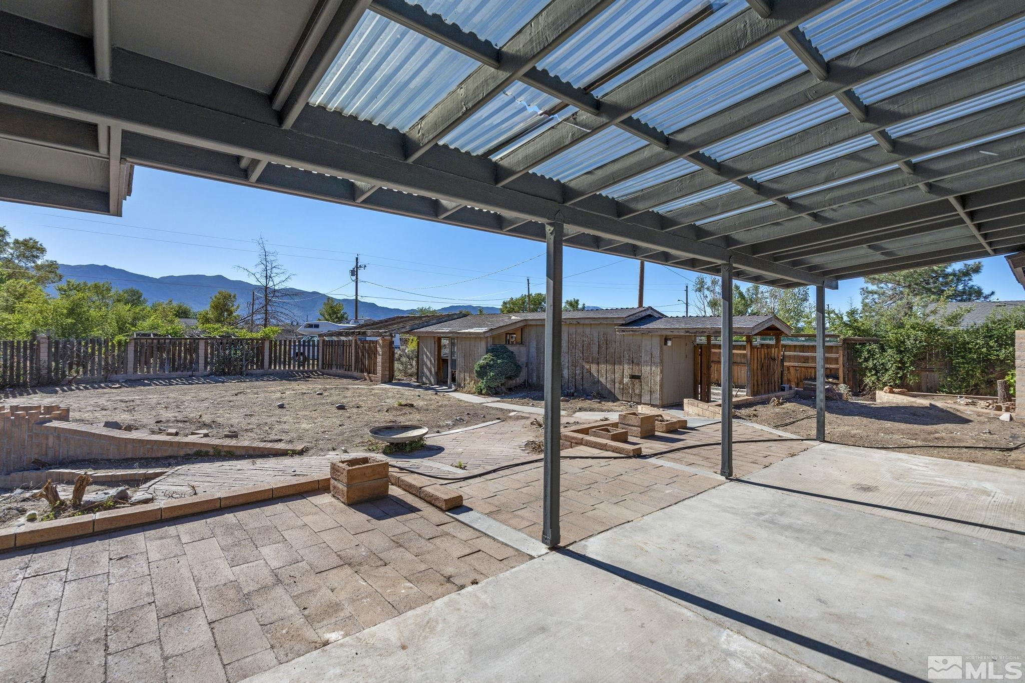 888 Dresslerville Road Gardnerville, NV 89460 - Photo 32 of 35 a view of a patio with a table and chairs