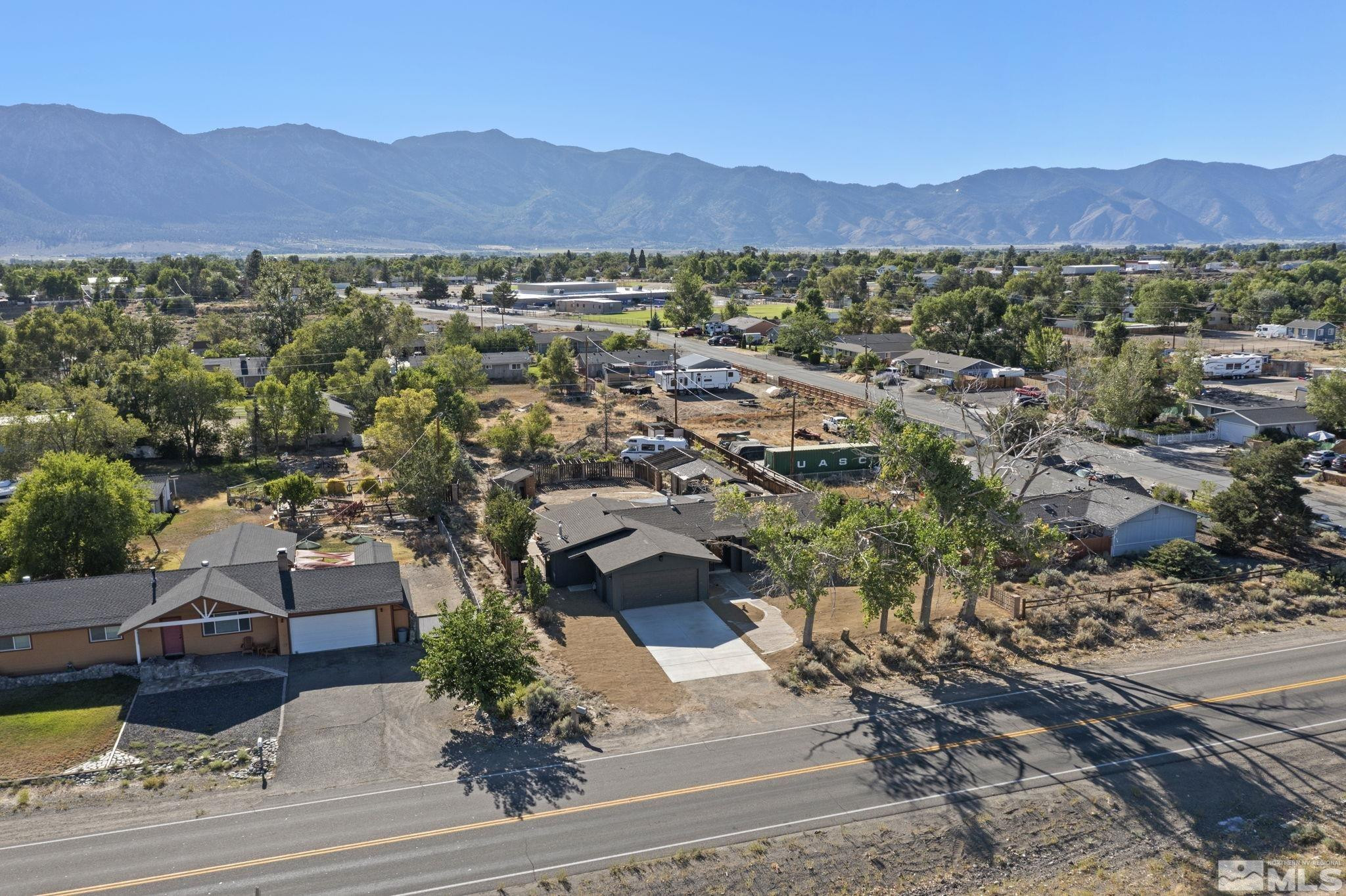 888 Dresslerville Road Gardnerville, NV 89460 - Photo 35 of 35 a view of a lush green hillside and a houses