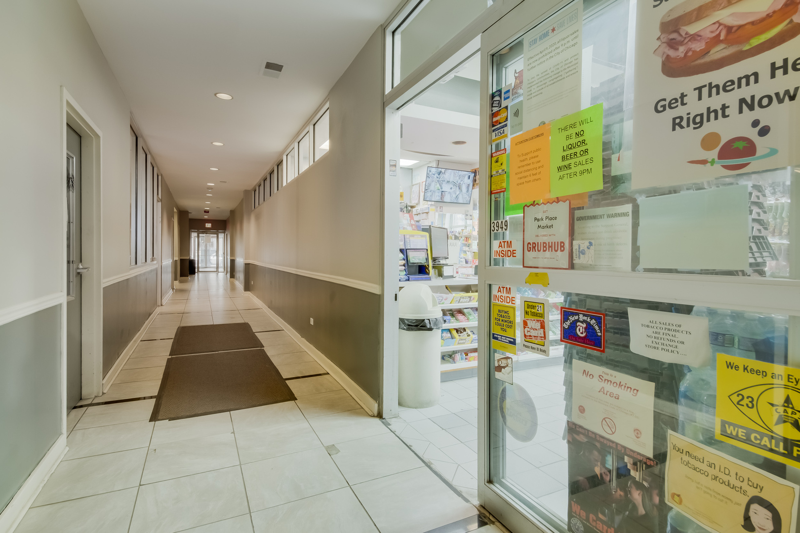 655 West Irving Park Road, Unit 4808 Chicago, IL 60613 - Photo 24 of 26 a hallway with a black white checkered floor