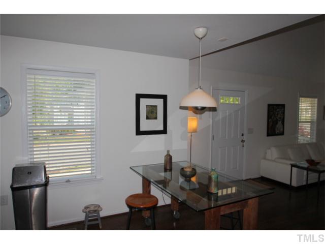 1137 South State Street Raleigh, NC 27601 - Photo 4 of 12 a living room with furniture and a window