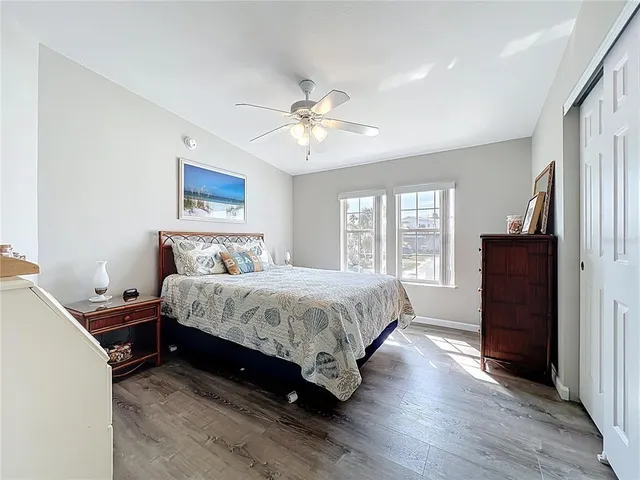 a bedroom with a bed and a view of bathroom