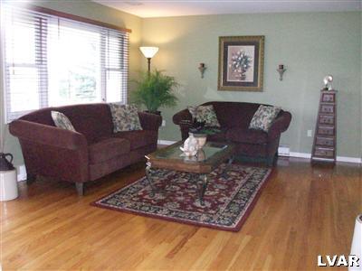 541 Bauer Road Bath, PA 18014 - Photo 3 of 8 a living room with furniture a rug and a large window