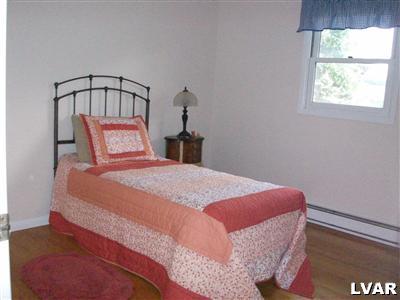 541 Bauer Road Bath, PA 18014 - Photo 5 of 8 a bedroom with a bed and a window