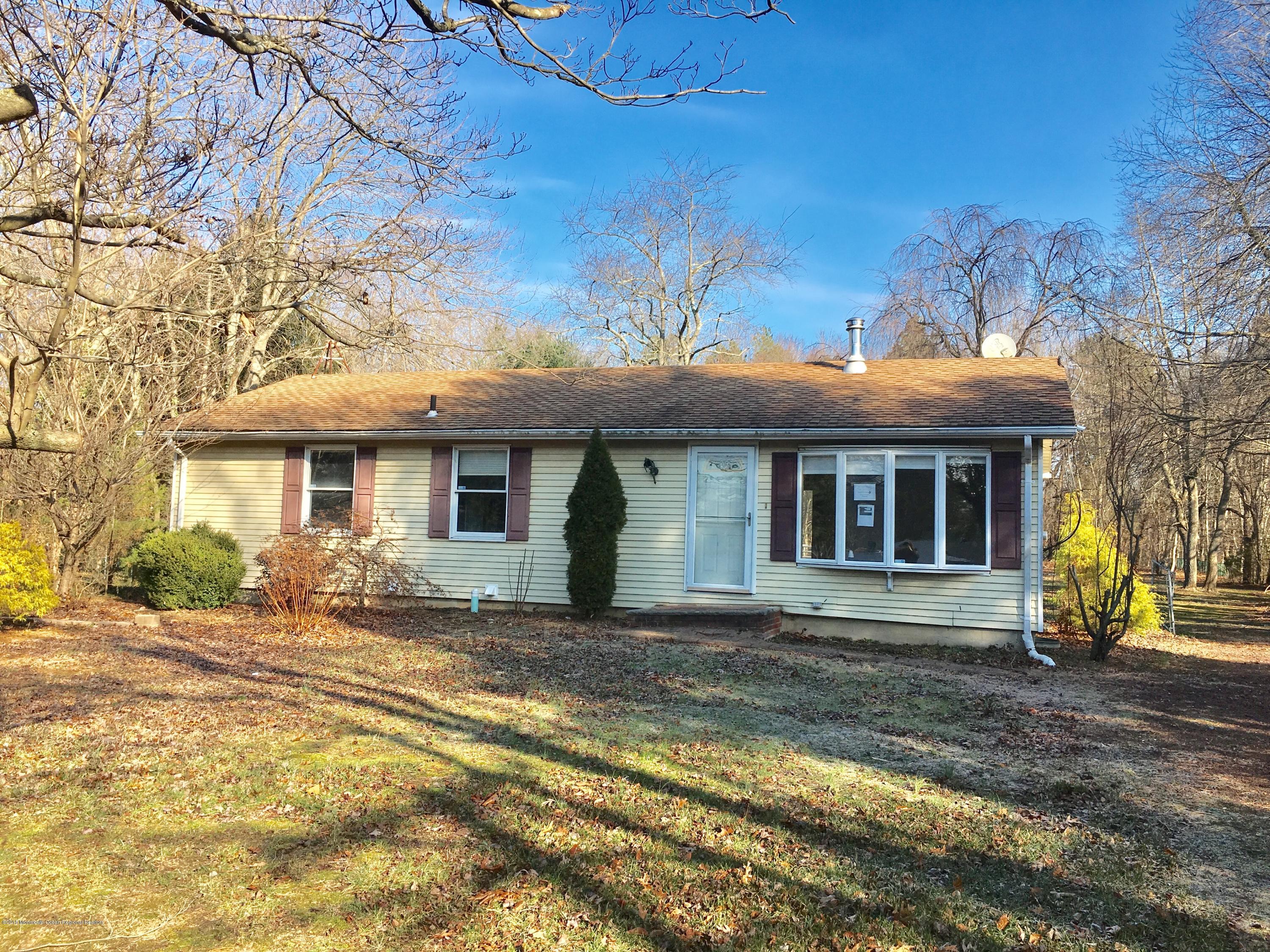 627 Leesville Road Jackson, NJ 08527 - Photo 1 of 17 a front view of a house with patio