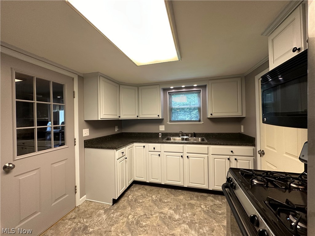 1086 Bruce Road Akron, OH 44306 - Photo 20 of 45 your new kitchen. mudroom to the left & back bedroom to the right