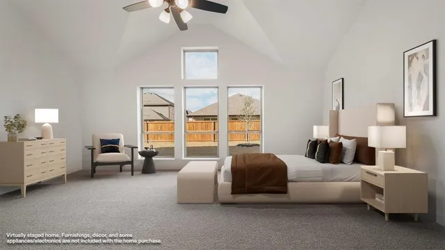 a bedroom with furniture and a chandelier