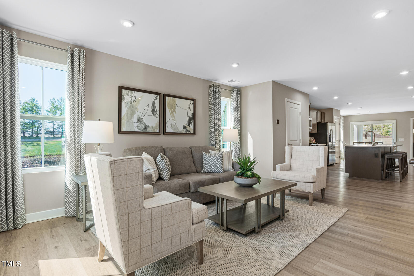 408 Grand Silo Road Raleigh, NC 27603 - Photo 17 of 25 a living room with furniture and wooden floor