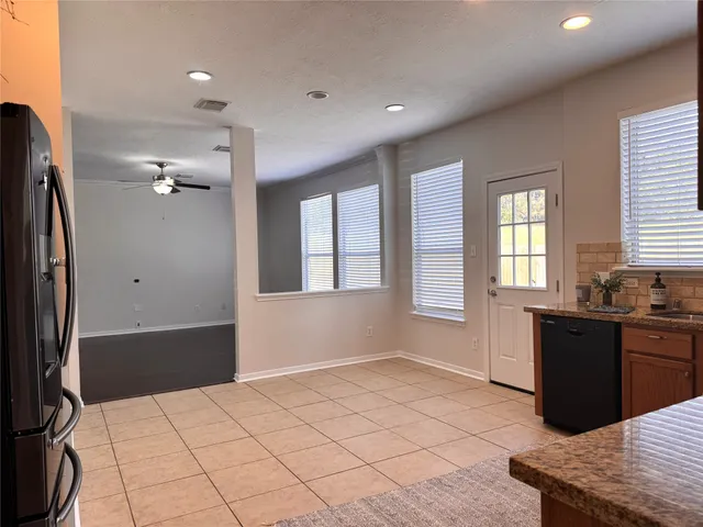 a view of kitchen with windows