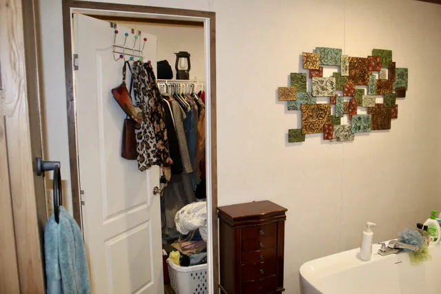 a bathroom with a sink and mirror