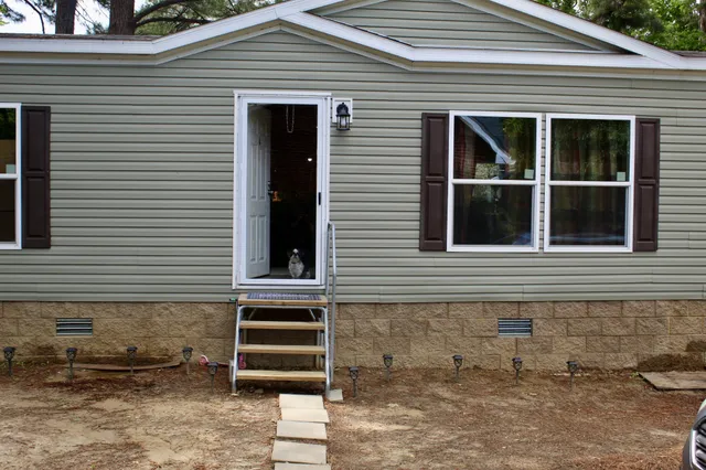 a front view of a house with windows