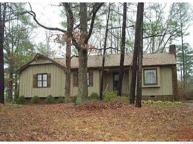 7520 Ray Road Raleigh, NC 27613 - Photo 1 of 1 front view of a house with a trees