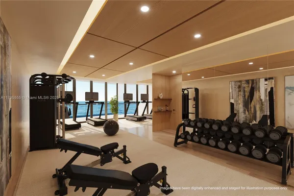 a room with gym equipment and floor to ceiling window