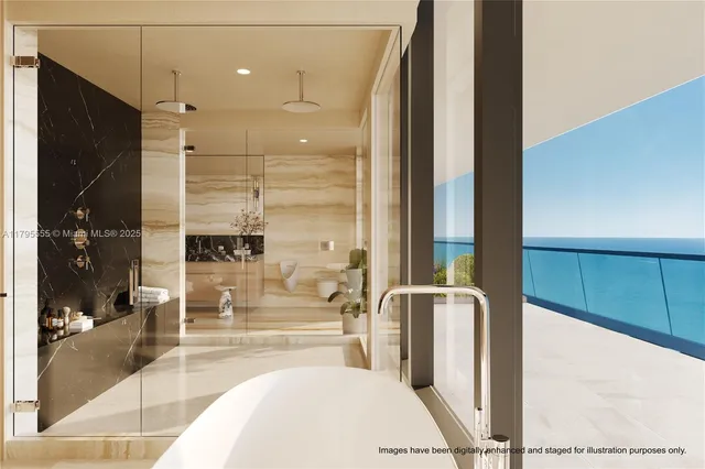 a bathroom with a tub and shower