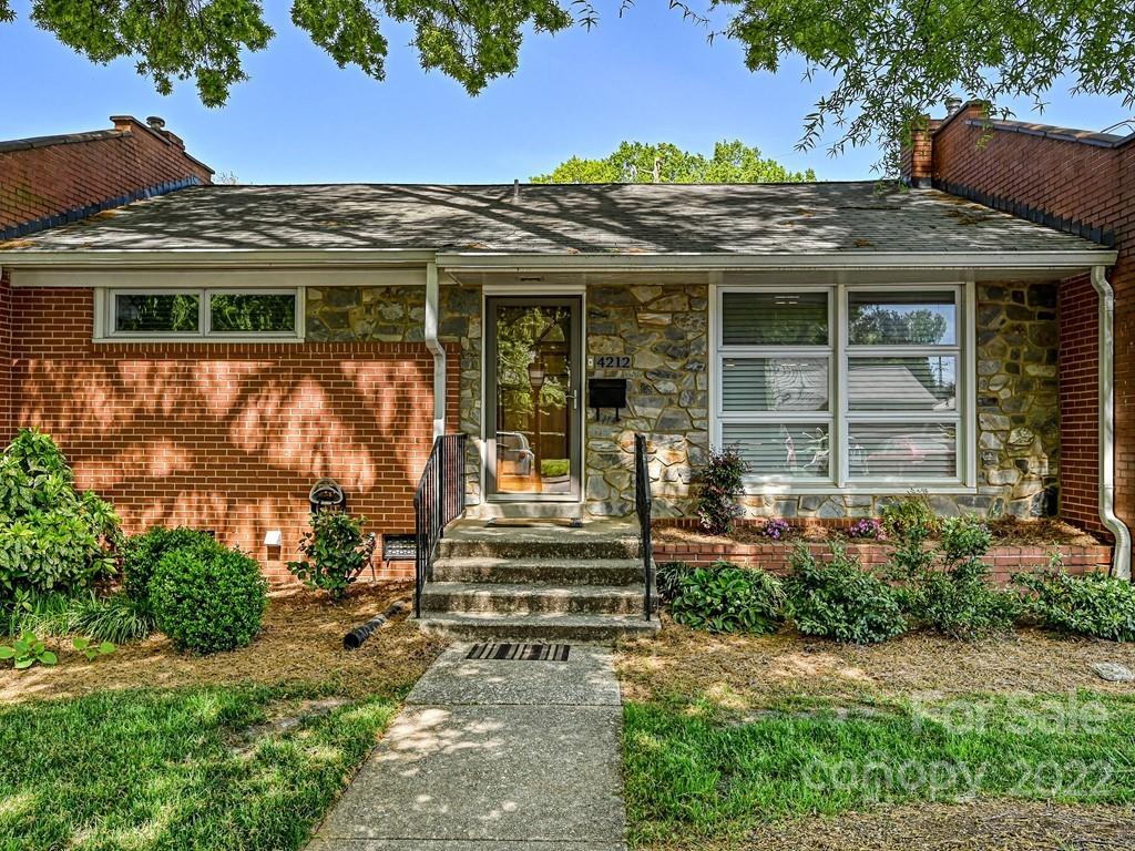 4212 Randolph Road Charlotte, NC 28211 - Photo 2 of 23 front view of a house with a porch