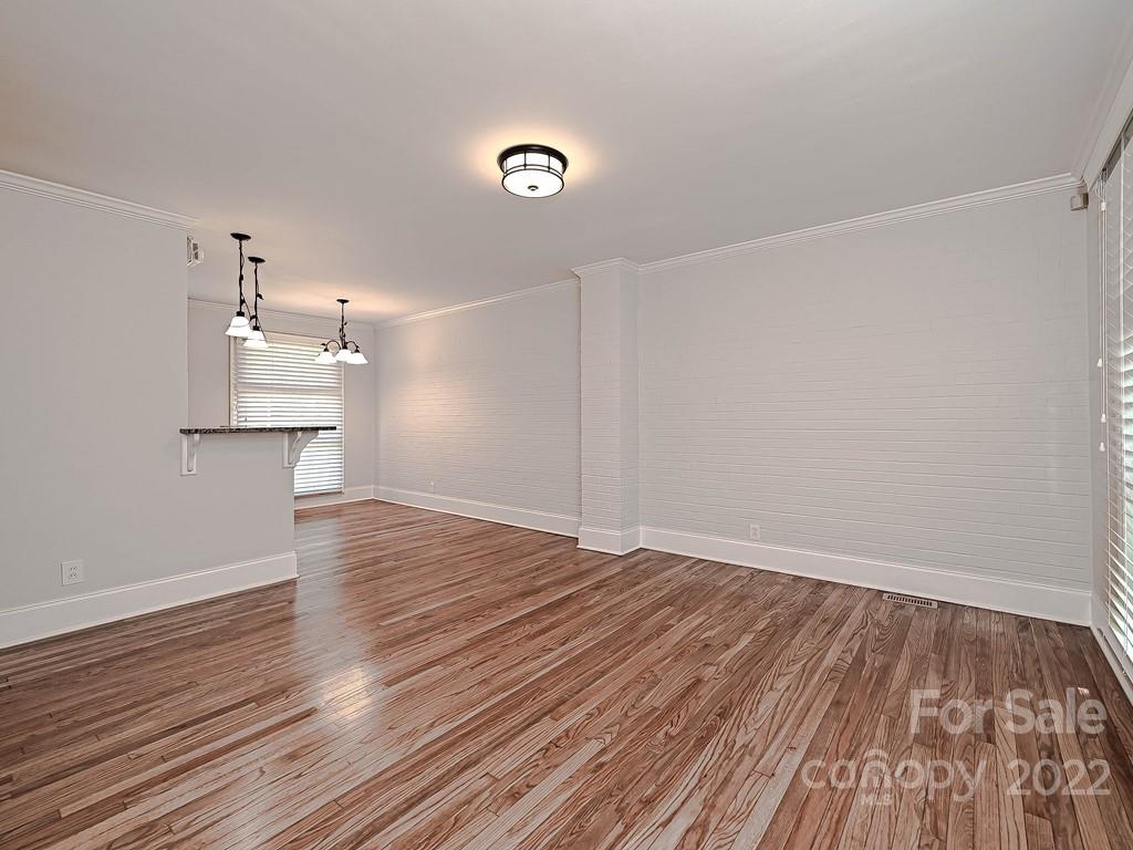 4212 Randolph Road Charlotte, NC 28211 - Photo 4 of 23 a view of empty room with wooden floor