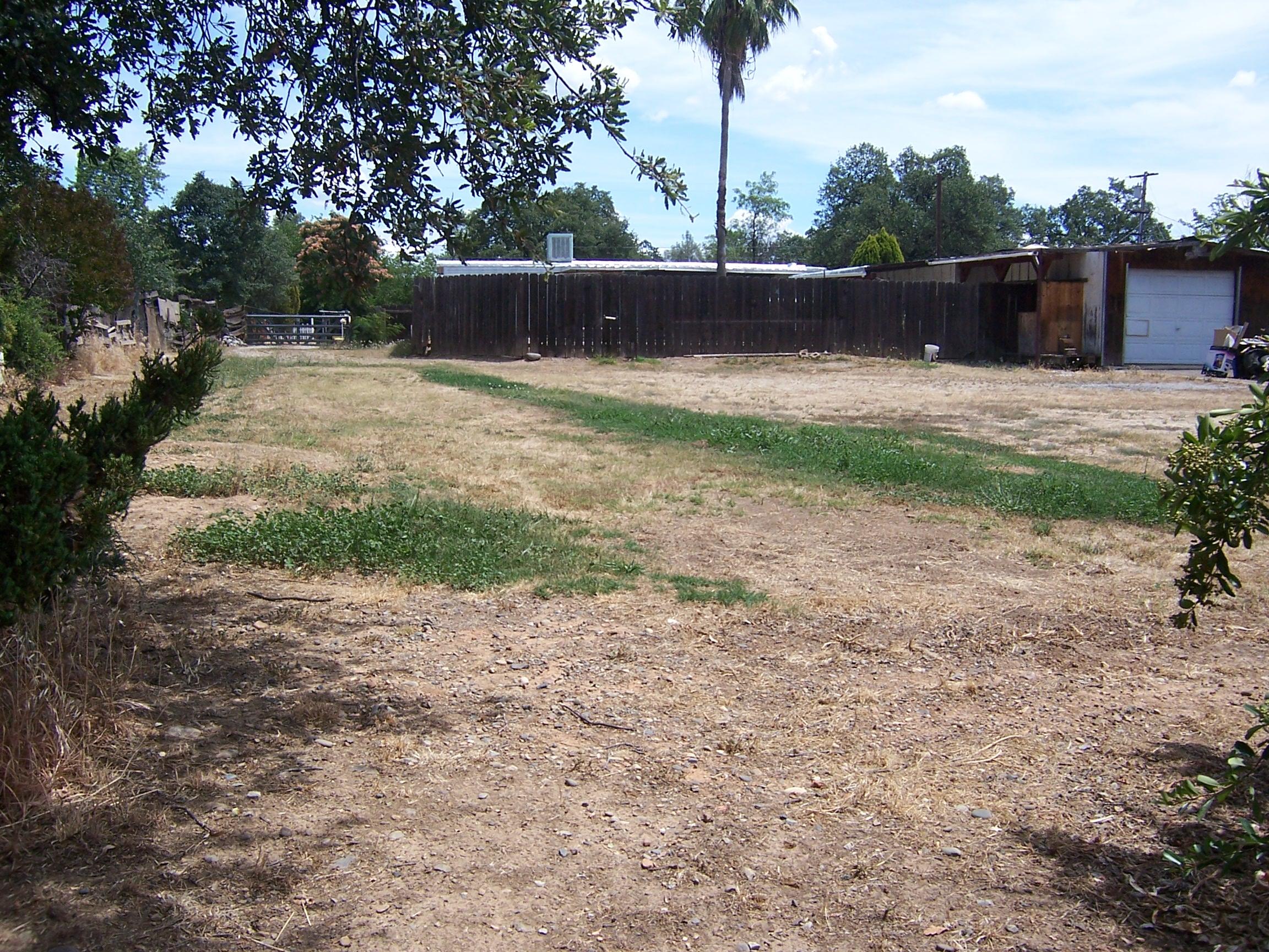 Scott Road Redding, CA 96003 - Photo 10 of 22 a view of a backyard with a small cabin