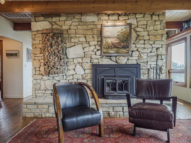 a room with furniture and wooden floor