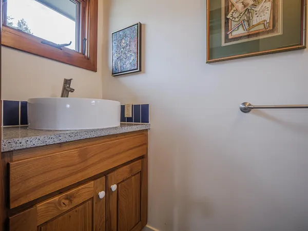 a view of ocean with green space