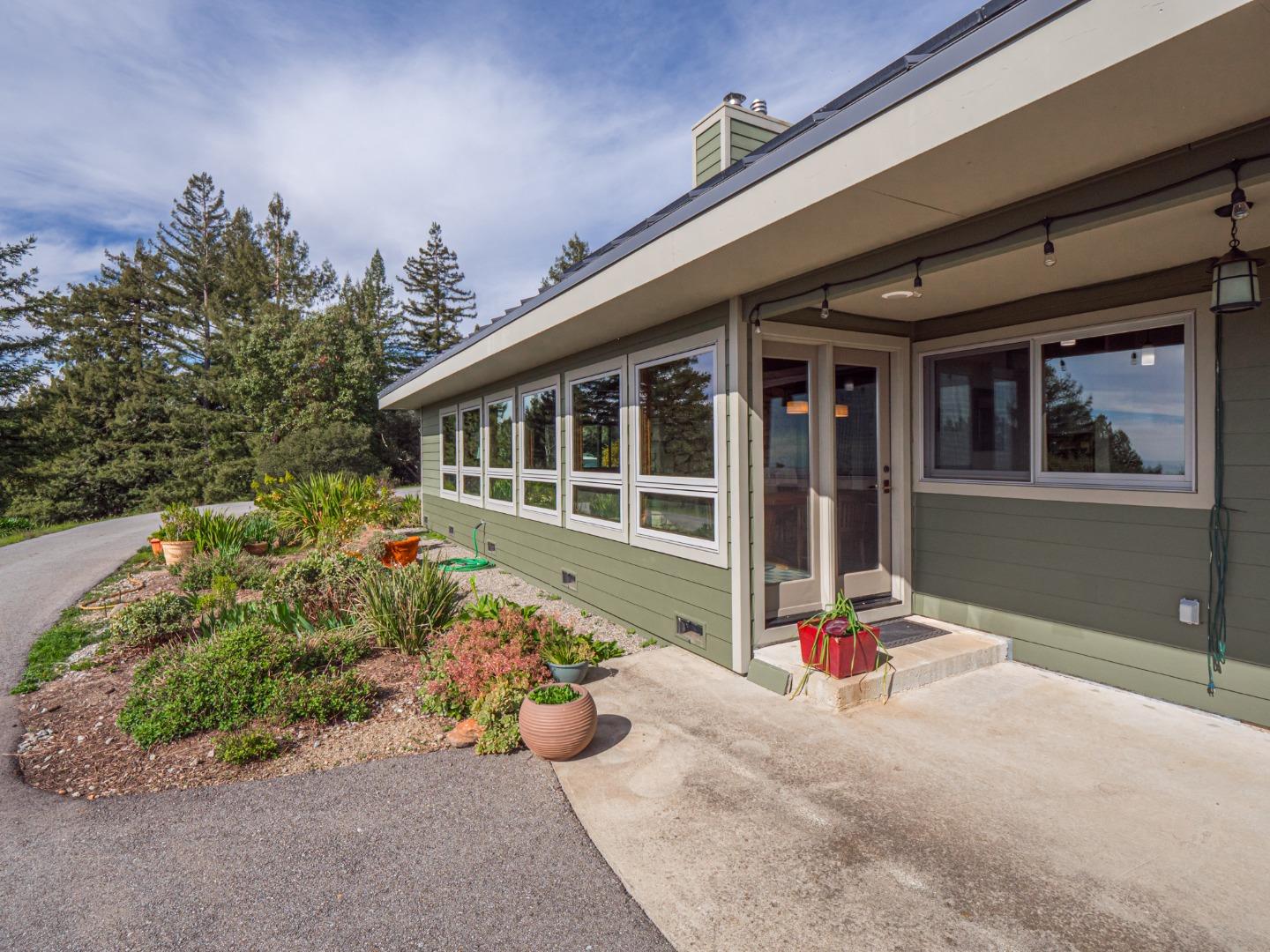 1584 Tindall Ranch Road Corralitos, CA 95076 - Photo 39 of 104 a front view of a house with a yard