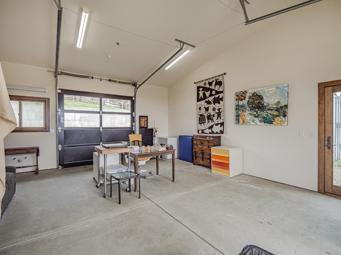 1584 Tindall Ranch Road Corralitos, CA 95076 - Photo 83 of 104 a living room with furniture a window and a table