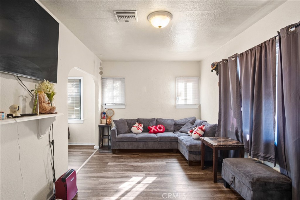 3420 Comer Avenue Riverside, CA 92507 - Photo 13 of 26 a living room with furniture window and wall painting