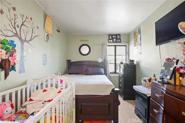 a children room with furniture and toys