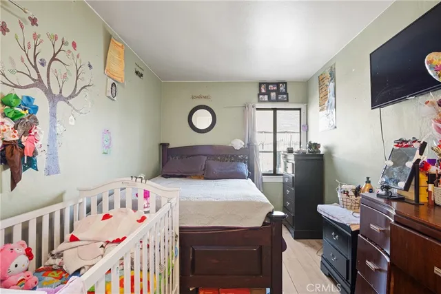 a children room with furniture and toys
