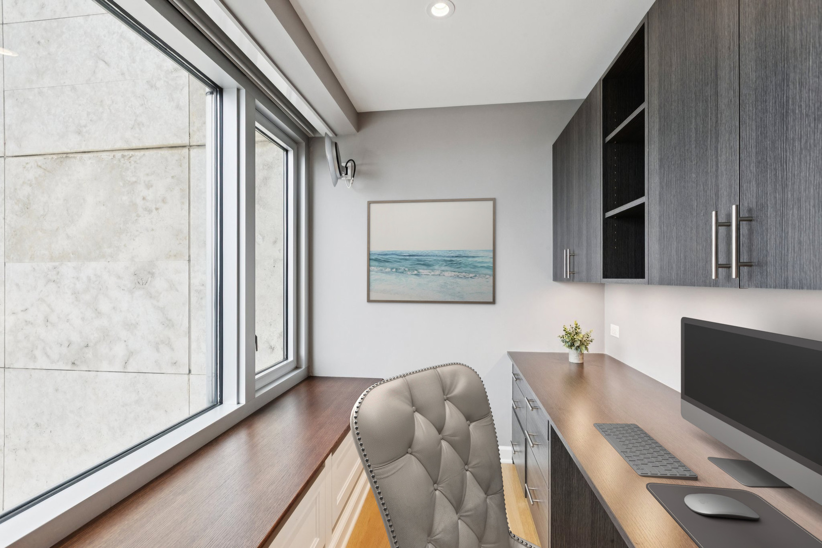 132 East Delaware Place, Unit 4803 Chicago, IL 60611 - Photo 29 of 53 a bedroom with furniture and a flat screen tv