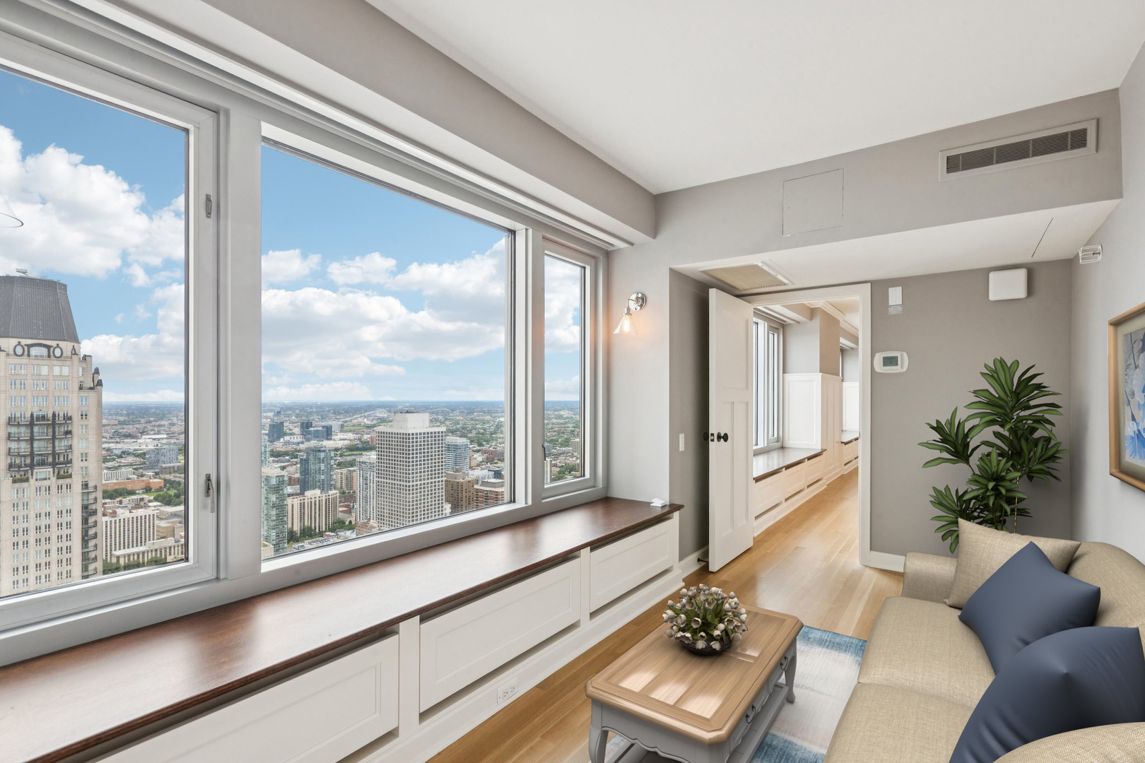 132 East Delaware Place, Unit 4803 Chicago, IL 60611 - Photo 38 of 53 a living room with furniture and a large window