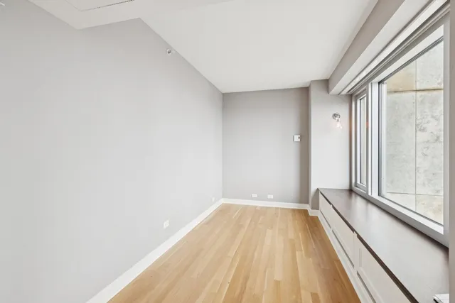 a view of a city from a corridor