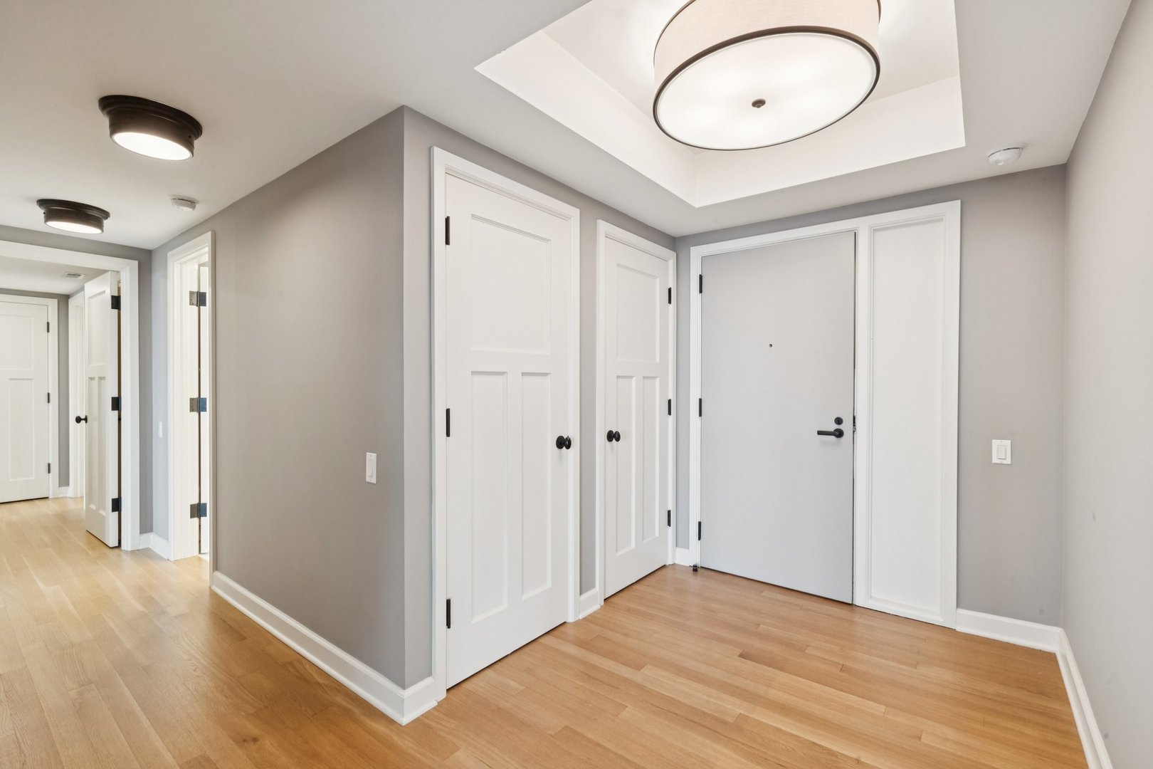 132 East Delaware Place, Unit 4803 Chicago, IL 60611 - Photo 43 of 53 a view of a room with wooden floor and bathroom