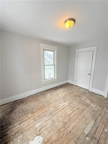 a kitchen with a stove and a refrigerator