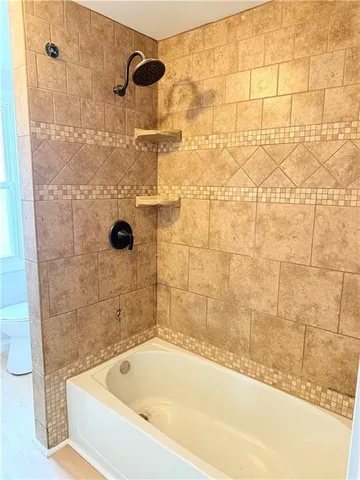 a bathroom with a bathtub