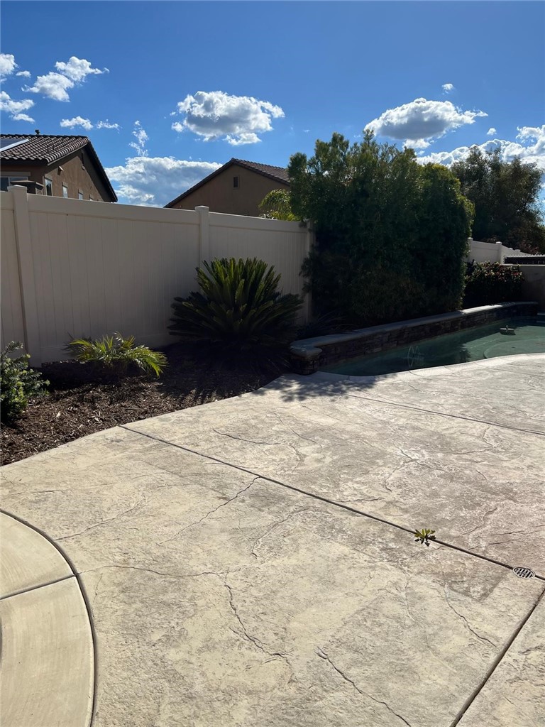 32689 Cottonwood Road Winchester, CA 92596 - Photo 15 of 25 a view of backyard with potted plants