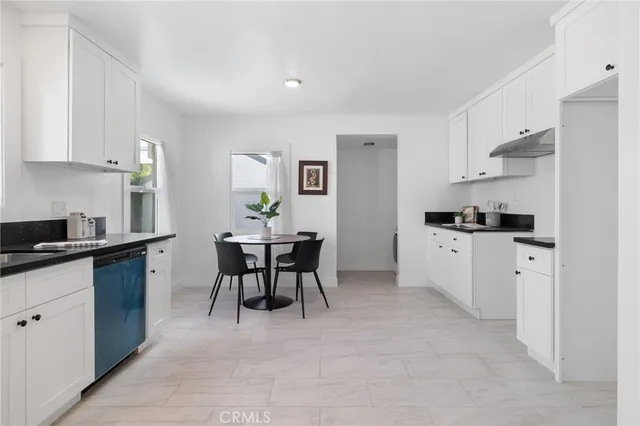a kitchen with granite countertop cabinets and counter space