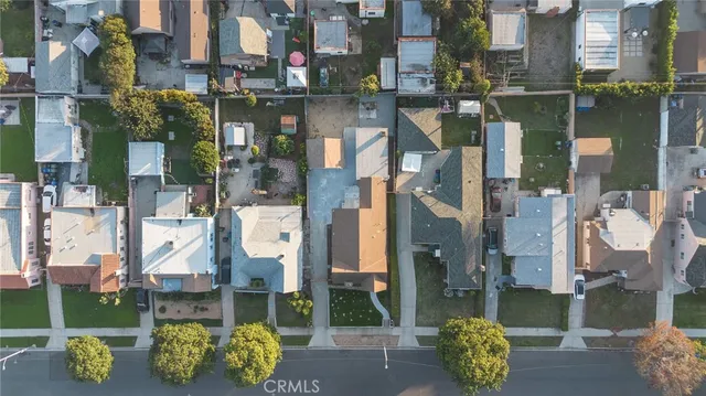 a front view of a building with outdoor seating