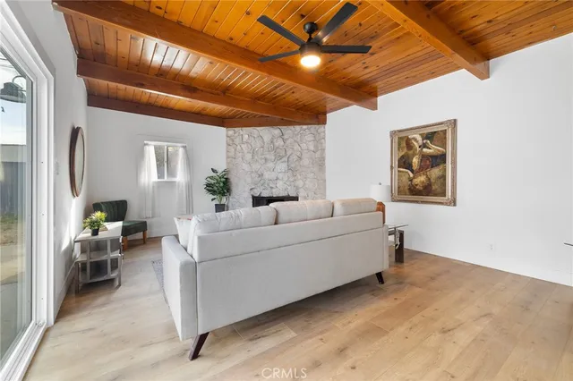 a living room with furniture and windows