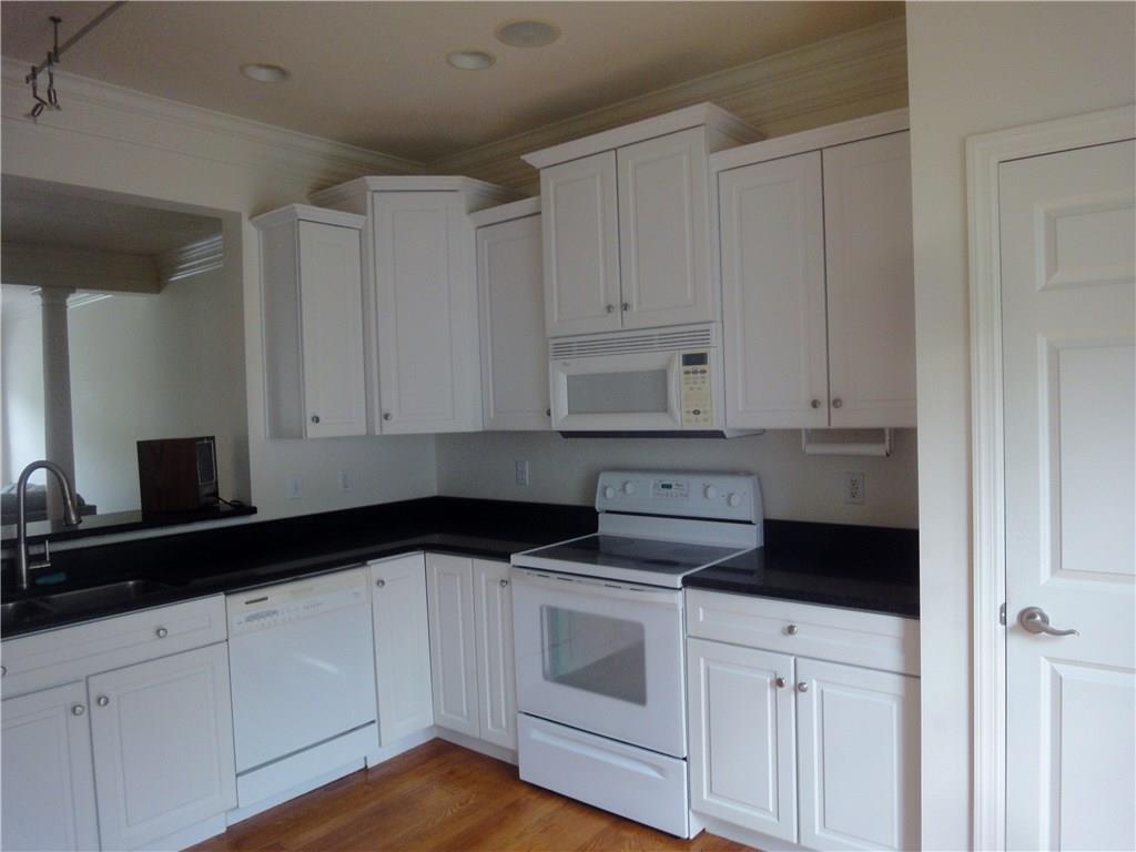 83 Shenot Road Wexford, PA 15090 - Photo 4 of 16 Beautiful kitchen has quartz countertops, upgraded appliances & walk out bay window.