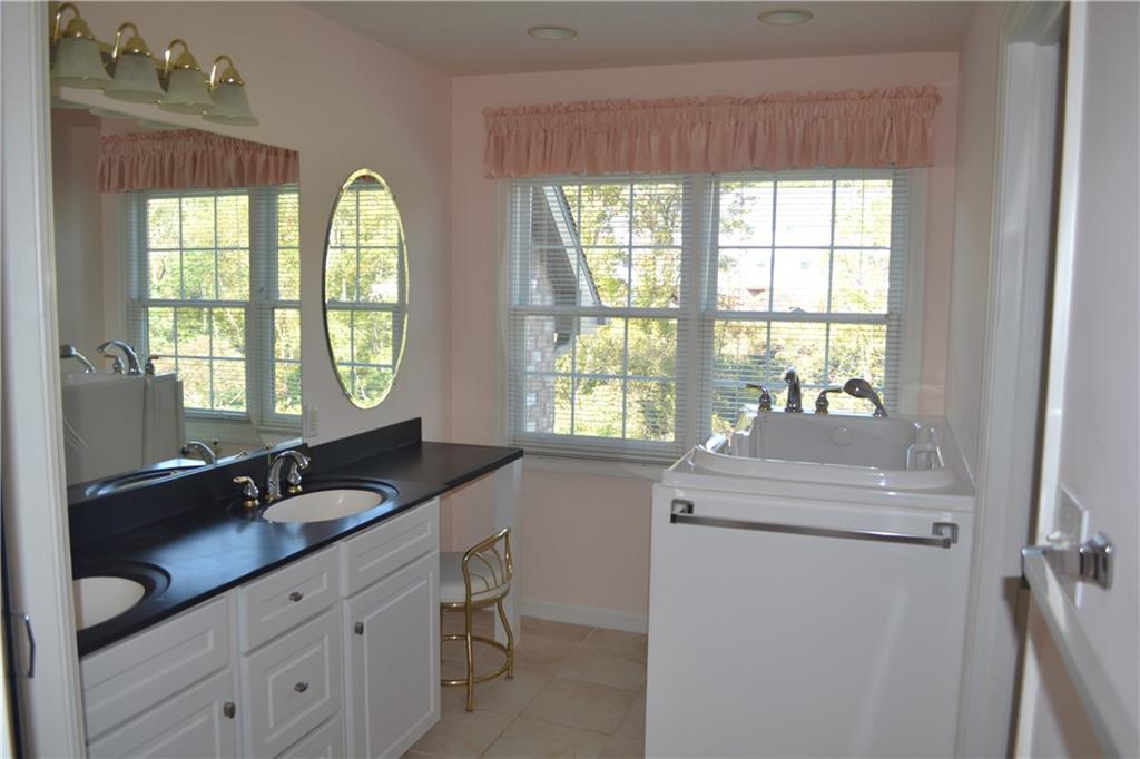 83 Shenot Road Wexford, PA 15090 - Photo 10 of 16 Deluxe master bath offers shower,2 sinks,vanity & walk in jet tub.