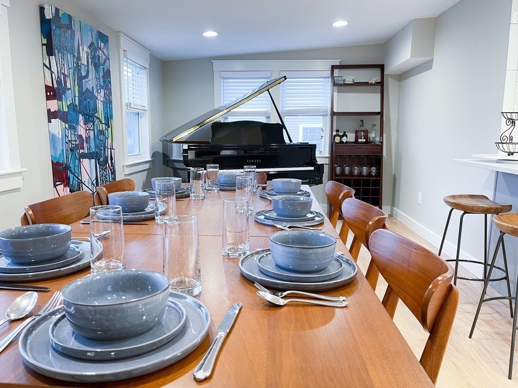 83 Rockridge Road Waltham, MA 02453 - Photo 2 of 16 a room with furniture and a painting