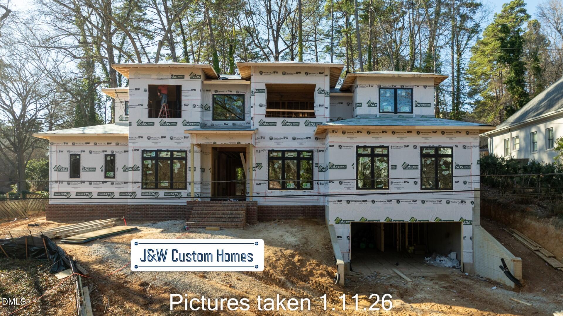 3521 Brook Drive Raleigh, NC 27609 - Photo 2 of 13 a view of a building with a couple of windows