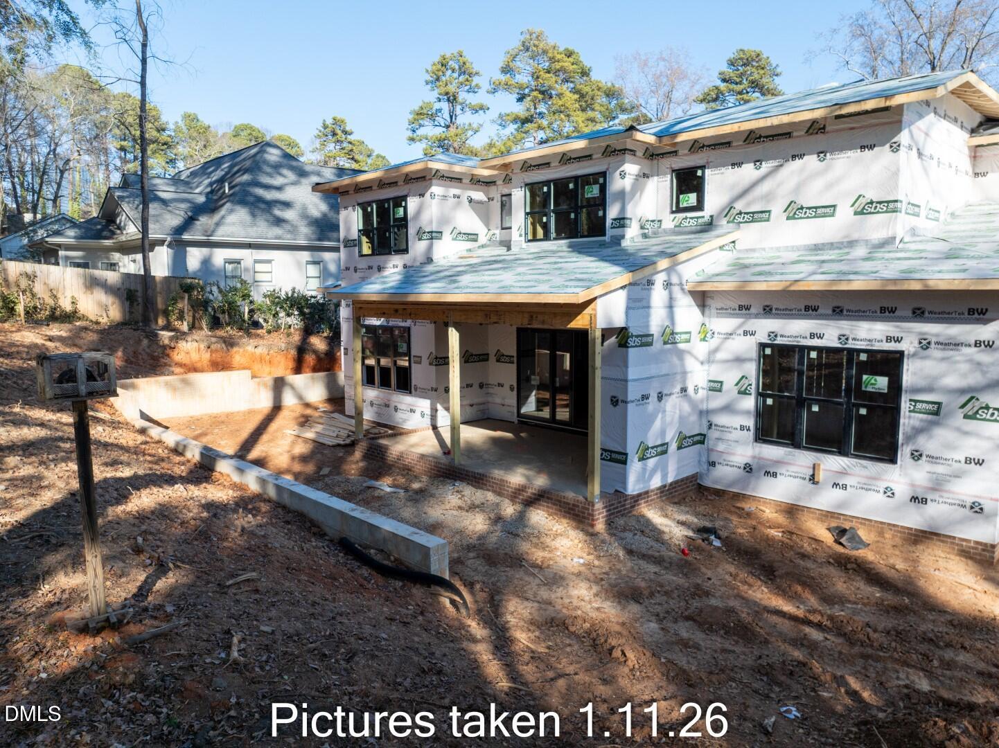 3521 Brook Drive Raleigh, NC 27609 - Photo 9 of 13 a view of a house with a patio
